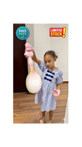 Kids playing with smoke bubble toy indoors