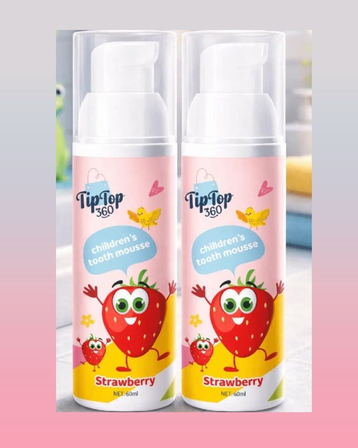 Two kids strawberry foam toothpaste bottles included in the complete smile kit