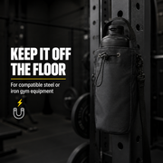 Black TipTop360 magnetic gym bag attached to compatible steel gym equipment, keeping a bottle off the floor